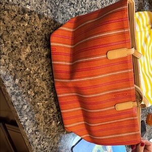Coach Vibrant Orange and Tan Striped Cosmetic Bag